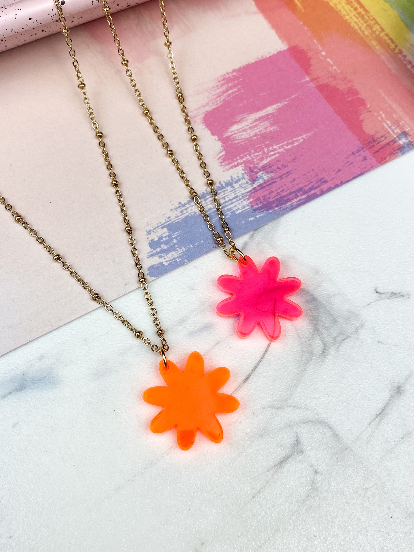collar en Stainless Steel perfecto para verano de flor en colores neones ( rosa y anaranjado )